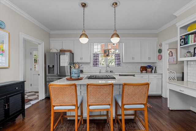 kitchen featuring ornamental molding, white cabinetry, dark wood-style floors, and stainless steel appliances