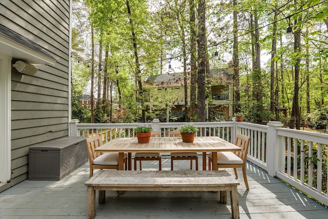 deck featuring outdoor dining area