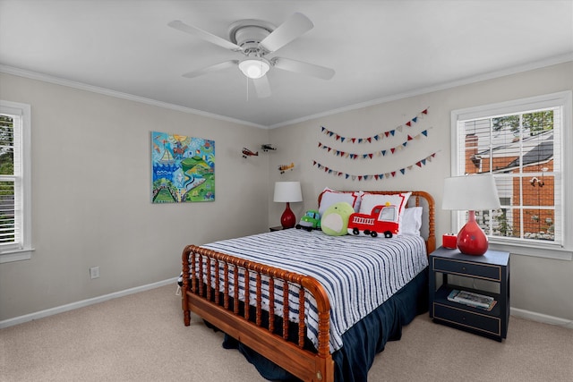 bedroom featuring carpet flooring, baseboards, multiple windows, and crown molding