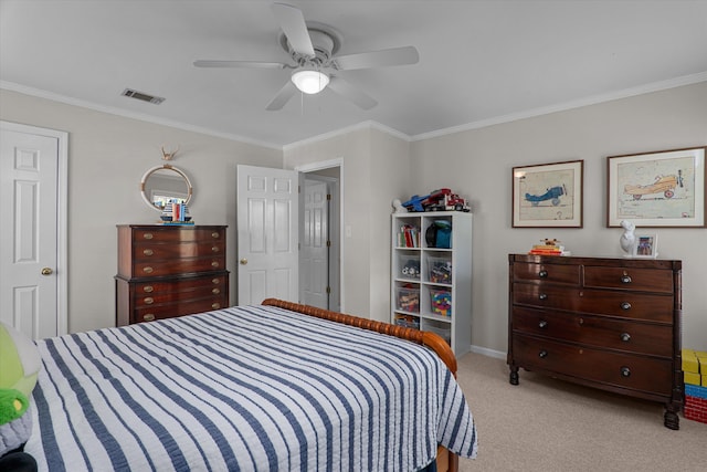 bedroom with ceiling fan, visible vents, baseboards, ornamental molding, and light carpet
