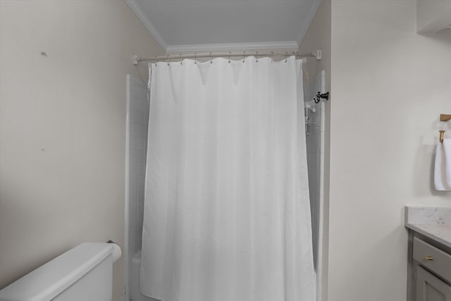 bathroom with crown molding, vanity, toilet, and a shower with shower curtain