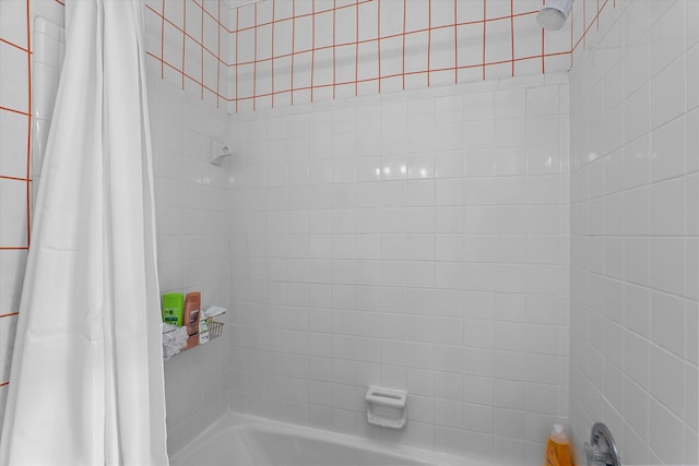 bathroom with shower / bath combo