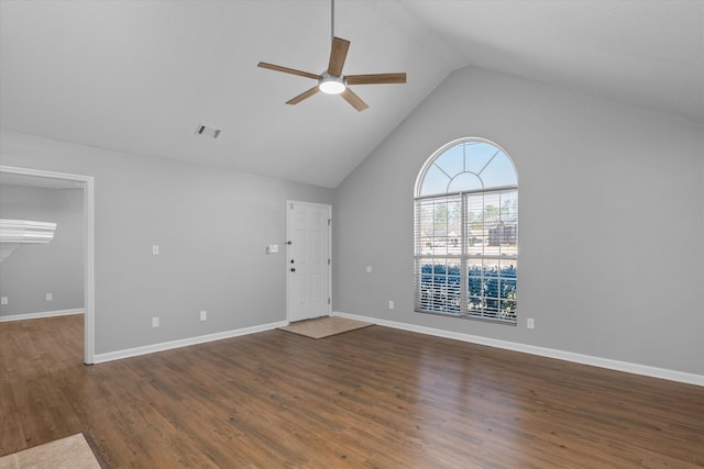 unfurnished living room with ceiling fan, high vaulted ceiling, and dark hardwood / wood-style floors