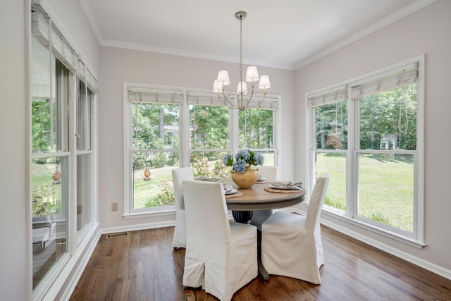 467 Baker Woods Trl, Martinez, GA 30907 - dining space featuring visible vents, baseboards, dark wood-style floors, a chandelier, and ornamental molding