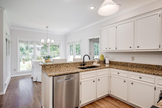 467 Baker Woods Trl, Martinez, GA 30907 - kitchen with stainless steel dishwasher, a sink, stone countertops, a peninsula, and white cabinetry