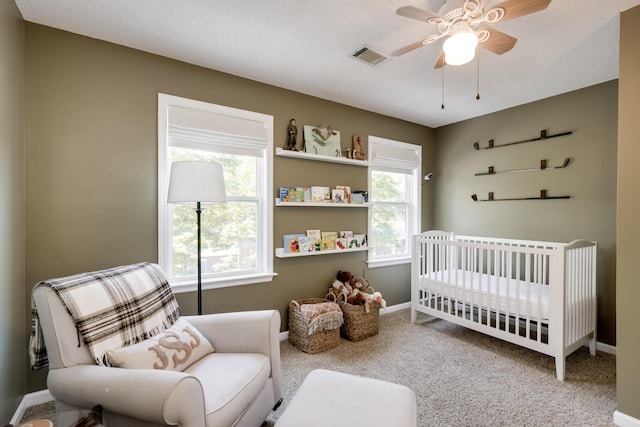 467 Baker Woods Trl, Martinez, GA 30907 - bedroom with carpet floors, baseboards, multiple windows, and a crib