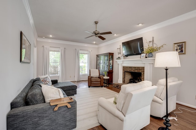 467 Baker Woods Trl, Martinez, GA 30907 - living room with ornamental molding, a fireplace, a ceiling fan, and wood finished floors