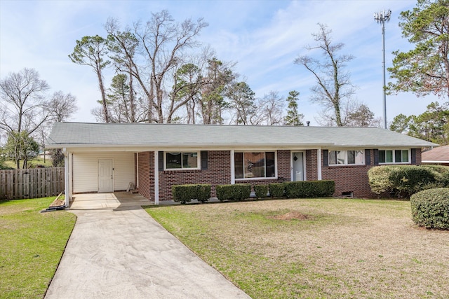 single story home with a front lawn and a carport