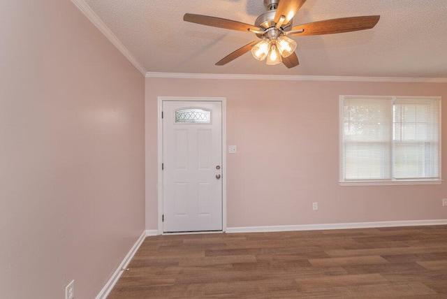153 Campbell Cir, Hephzibah, GA 30815 - foyer with ceiling fan, wood finished floors, a textured ceiling, and ornamental molding