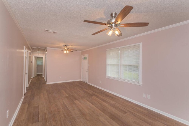 153 Campbell Cir, Hephzibah, GA 30815 - unfurnished room with attic access, a textured ceiling, wood finished floors, a ceiling fan, and crown molding