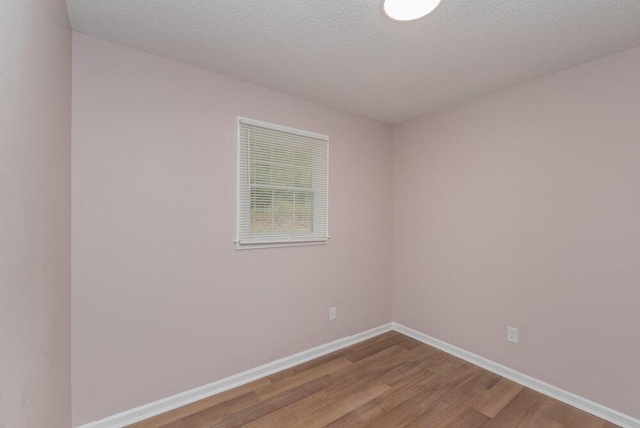 153 Campbell Cir, Hephzibah, GA 30815 - spare room with wood finished floors and baseboards