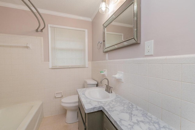153 Campbell Cir, Hephzibah, GA 30815 - full bath featuring tile patterned floors, tile walls, vanity, ornamental molding, and wainscoting
