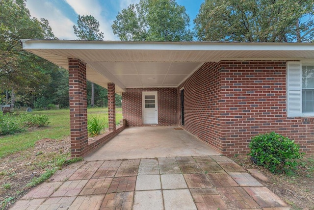 153 Campbell Cir, Hephzibah, GA 30815 - view of parking with concrete driveway and a carport