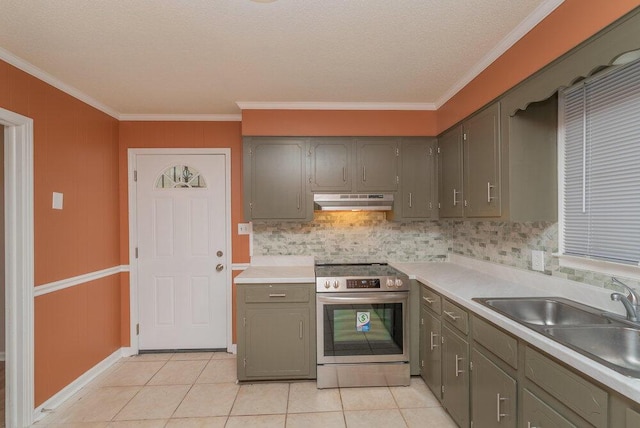 153 Campbell Cir, Hephzibah, GA 30815 - kitchen with stainless steel range with electric cooktop, under cabinet range hood, gray cabinetry, ornamental molding, and backsplash