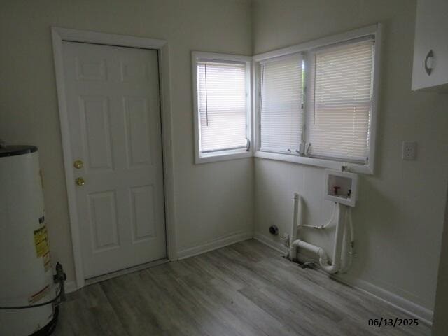1642 Whitney St, Augusta, GA 30904 - laundry area with water heater, wood finished floors, and hookup for a washing machine