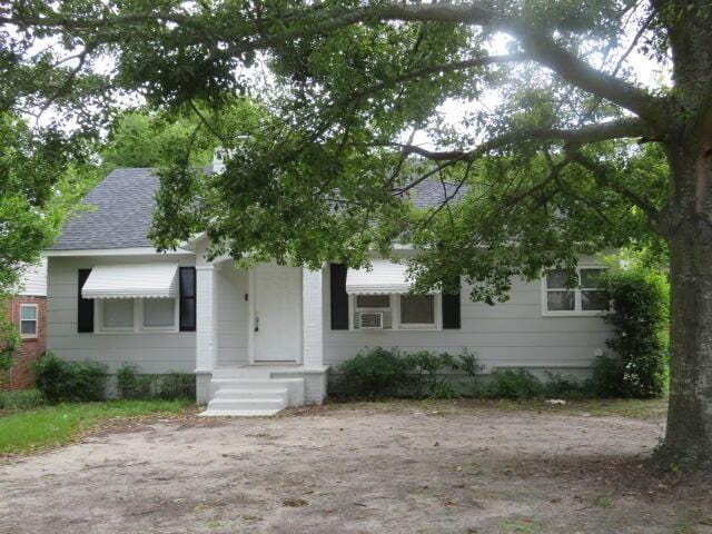 1642 Whitney St, Augusta, GA 30904 - view of property hidden behind natural elements with roof with shingles
