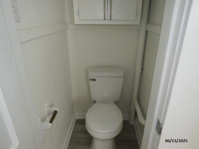 1642 Whitney St, Augusta, GA 30904 - bathroom with toilet and wood finished floors