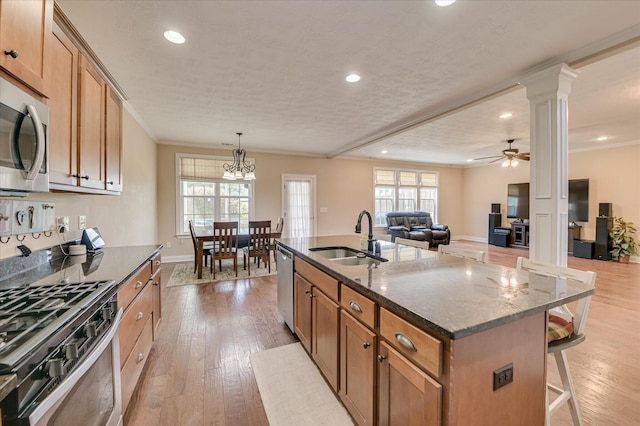 kitchen featuring a sink, appliances with stainless steel finishes, and recessed lighting