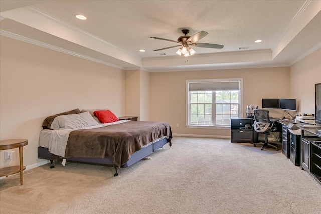 carpeted bedroom featuring recessed lighting, baseboards, a tray ceiling, visible vents, and ornamental molding