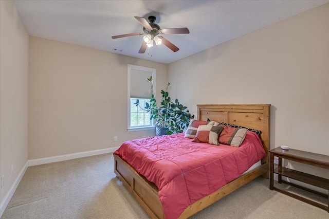bedroom featuring carpet floors, baseboards, ceiling fan, and visible vents