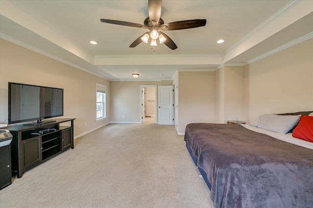bedroom with baseboards, ornamental molding, a raised ceiling, and light colored carpet