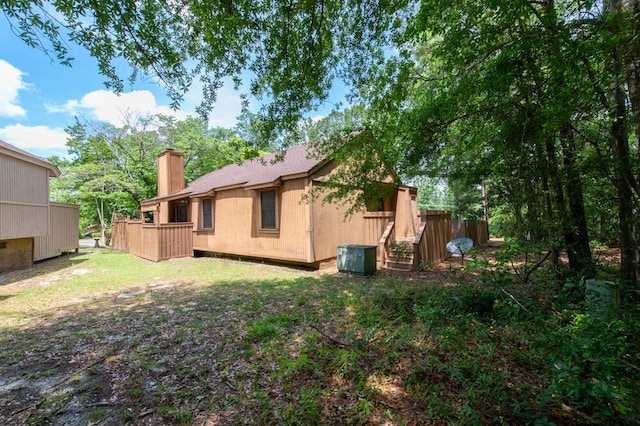 50 Bluff Pointe Way, Aiken, SC 29803 - rear view of house with a chimney and central air condition unit
