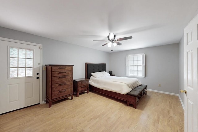 50 Bluff Pointe Way, Aiken, SC 29803 - bedroom with multiple windows, light wood-style floors, baseboards, and a ceiling fan