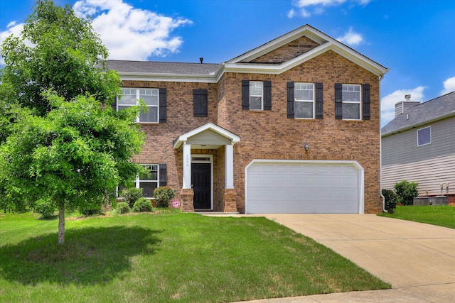 1052 Dietrich Ln, North Augusta, SC 29860 - view of front of property featuring a garage, a front lawn, concrete driveway, and brick siding