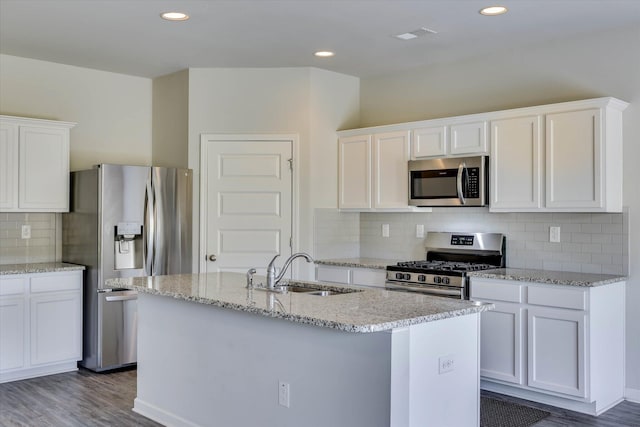 1052 Dietrich Ln, North Augusta, SC 29860 - kitchen featuring stainless steel appliances, white cabinetry, dark wood-style floors, and recessed lighting