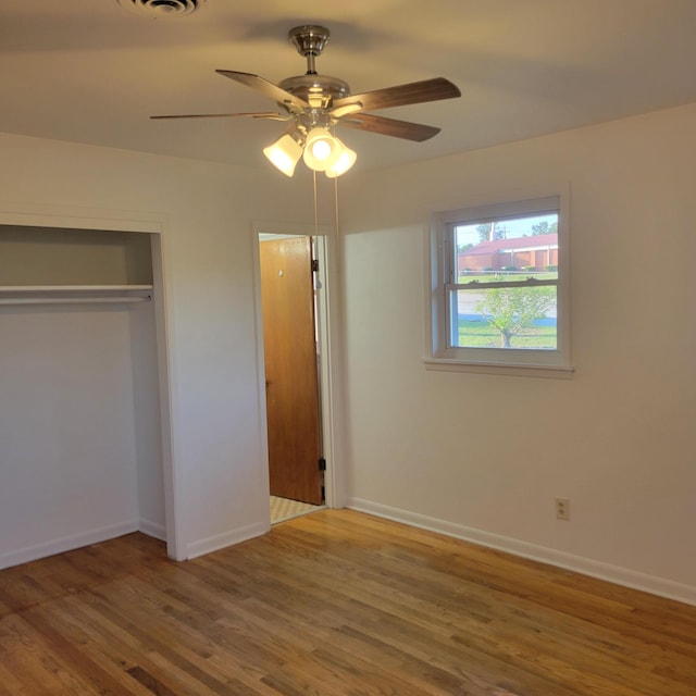 2514 Cascade Dr, Augusta, GA 30904 - unfurnished bedroom featuring wood finished floors, a closet, and baseboards