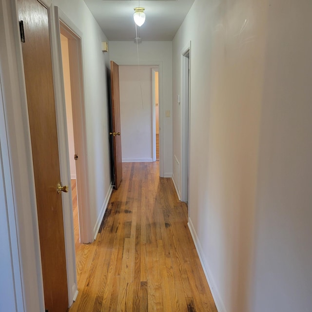2514 Cascade Dr, Augusta, GA 30904 - hallway featuring light wood-style flooring and baseboards