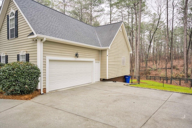 view of home's exterior with a garage