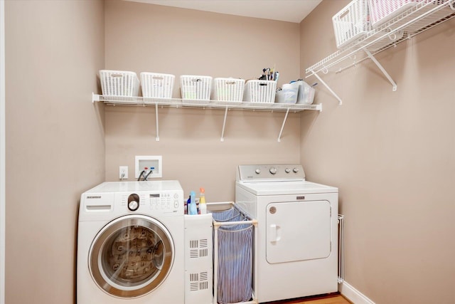 laundry area featuring washer and clothes dryer