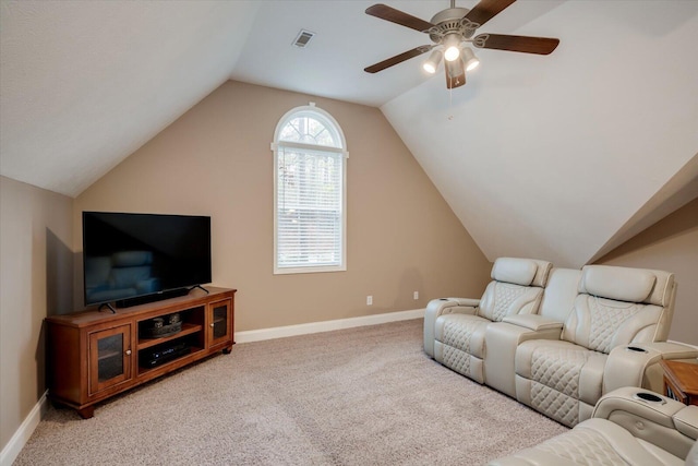 living room featuring ceiling fan, light colored carpet, and lofted ceiling