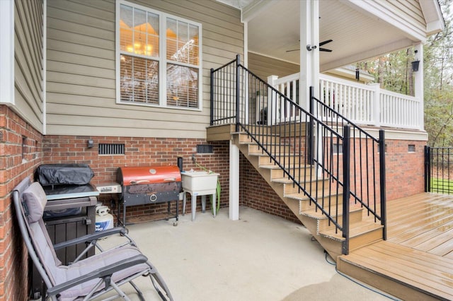 view of patio / terrace with area for grilling and ceiling fan