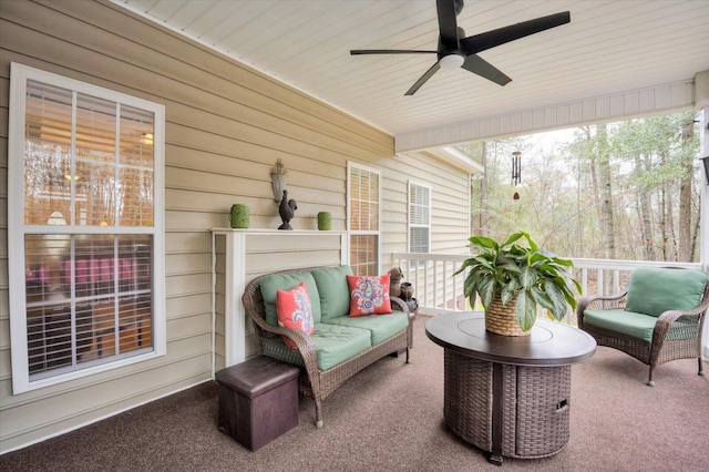 sunroom / solarium with ceiling fan