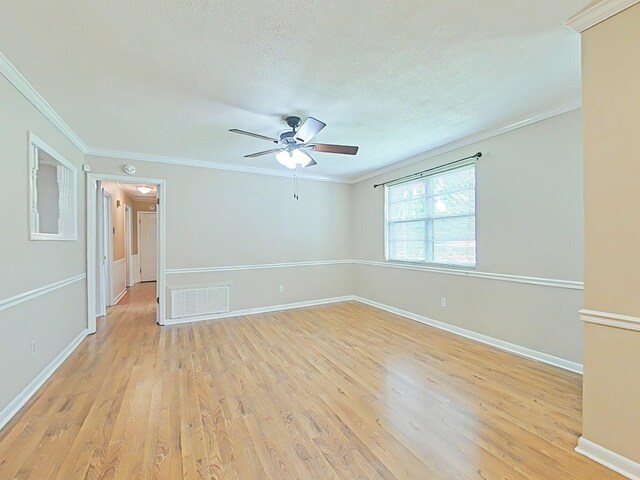 4532 Oakley Pirkle Rd, Martinez, GA 30907 - spare room featuring light wood-style flooring, a ceiling fan, crown molding, a textured ceiling, and a smoke detector