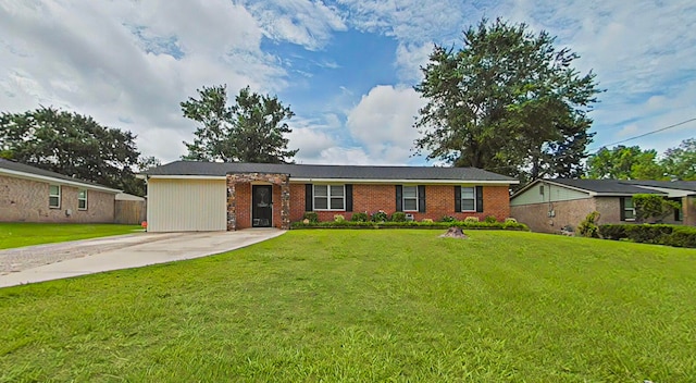 4532 Oakley Pirkle Rd, Martinez, GA 30907 - single story home featuring a front lawn, brick siding, and driveway