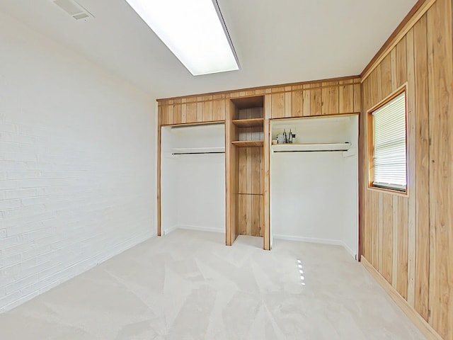 4532 Oakley Pirkle Rd, Martinez, GA 30907 - unfurnished bedroom featuring light colored carpet and wooden walls