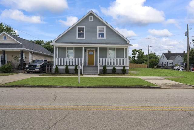 1118 Dantignac St, Augusta, GA 30901 - bungalow-style home featuring a porch, a front lawn, and concrete driveway