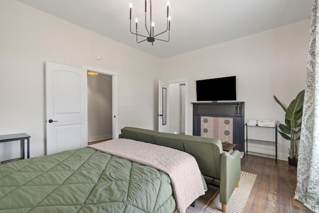 1118 Dantignac St, Augusta, GA 30901 - bedroom featuring a chandelier, wood-type flooring, and baseboards