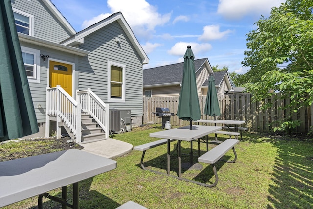 1118 Dantignac St, Augusta, GA 30901 - view of yard with central AC unit and entry steps