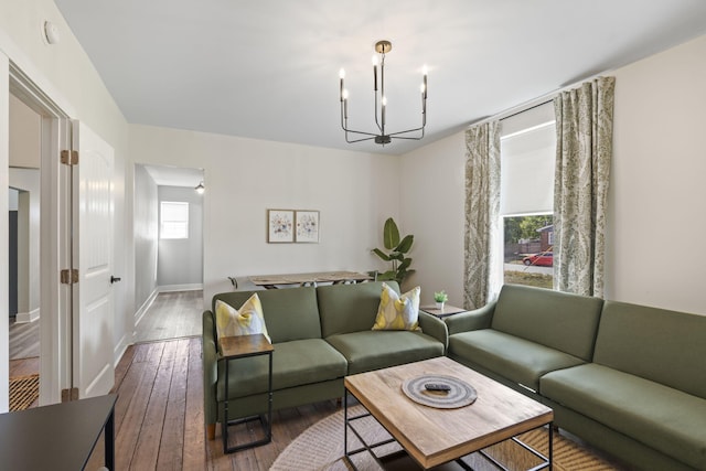 1118 Dantignac St, Augusta, GA 30901 - living room with a chandelier, hardwood / wood-style flooring, and baseboards