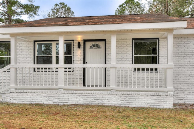 property entrance with a porch