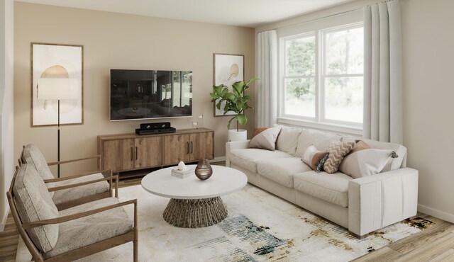 772 Count Fleet Ct, Graniteville, SC 29829 - living room featuring baseboards and wood finished floors