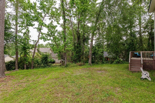 762 Winding Creek Ct, Evans, GA 30809 - view of green lawn with a wooden deck and stairway