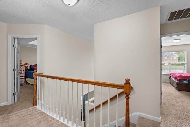 762 Winding Creek Ct, Evans, GA 30809 - corridor with an upstairs landing, carpet floors, baseboards, and a textured ceiling