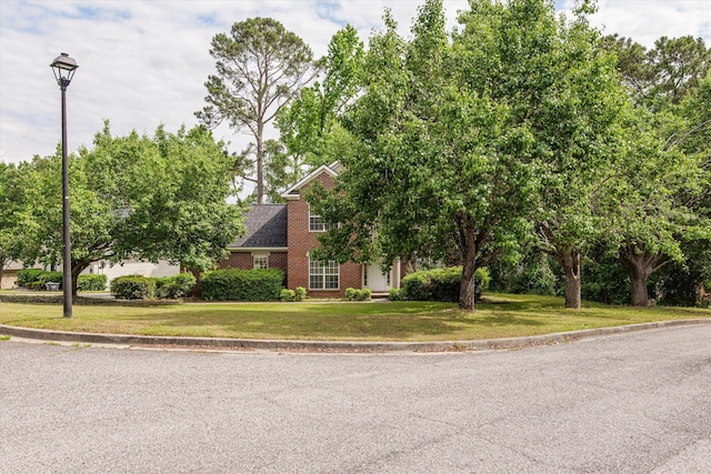 762 Winding Creek Ct, Evans, GA 30809 - view of front facade with a front yard, brick siding, and roof with shingles