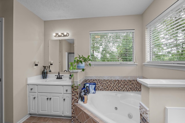 762 Winding Creek Ct, Evans, GA 30809 - bathroom featuring a whirlpool tub, vanity, and tile patterned flooring