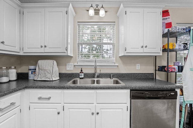 762 Winding Creek Ct, Evans, GA 30809 - kitchen with stainless steel dishwasher, a sink, dark countertops, white cabinetry, and crown molding